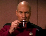 Captain Picard thoughtful and sipping what we can only assume to be tea, Earl Grey, hot.