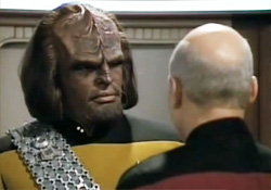 Worf talking with Picard