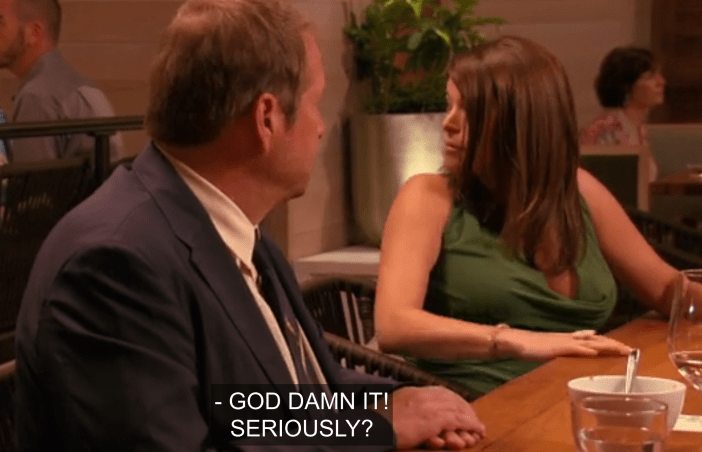 David Kinch and Gail Simmons turning around in surprise at hearing "GOD DAMN IT! SERIOUSLY?" from the kitchen